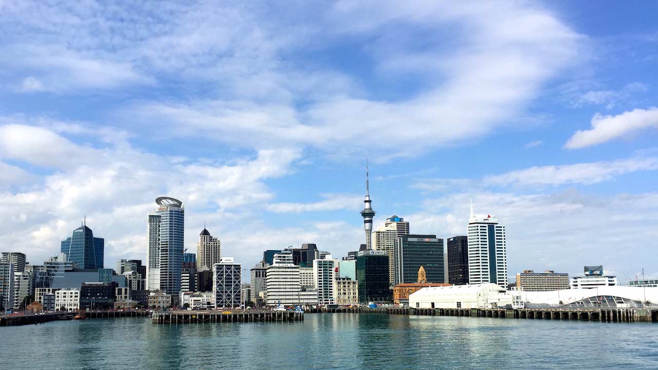 Auckland's cityscape, waterfront view on a sunny day