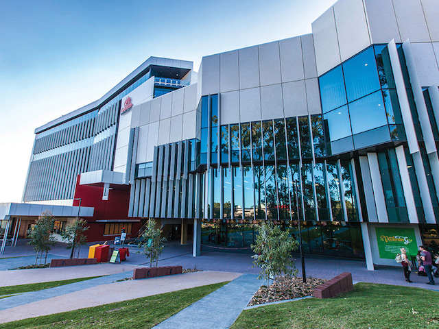 Two gray buildings on Griffith's Gold Coast campus