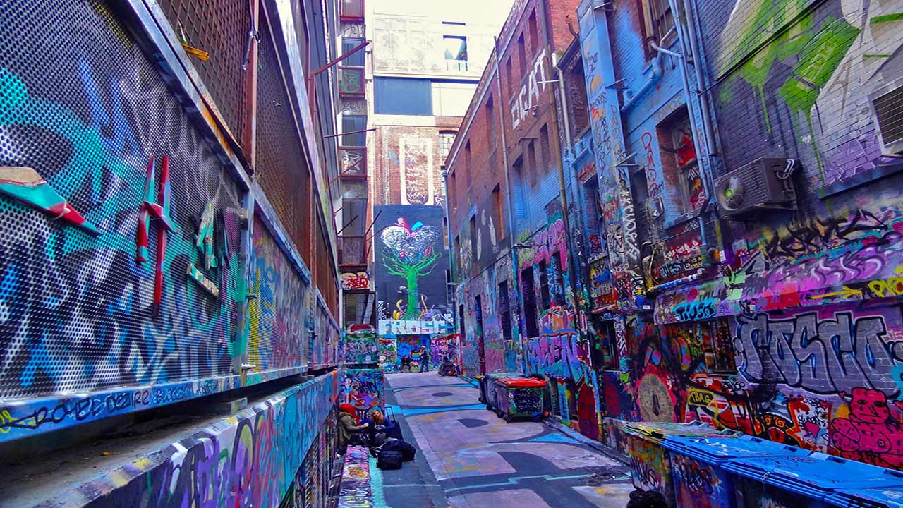 An alleyway in downtown Melbourne that is covered in graffiti from local artists