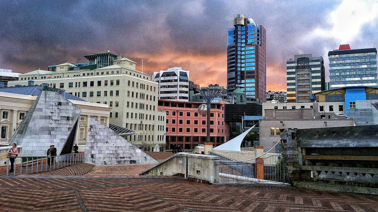 Stormy skies roll in behind downtown Wellington, New Zealand