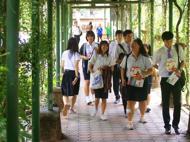 Chiang Mai University students walking through on-campus